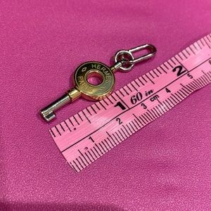 Hermes key pendant